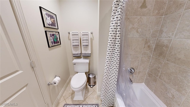 bathroom with tile patterned flooring, shower / tub combo, and toilet