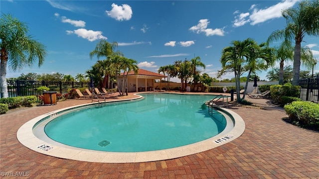 view of swimming pool with a patio