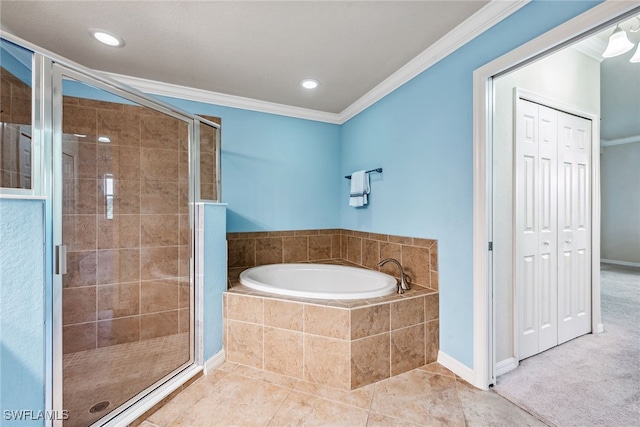 bathroom with tile patterned floors, crown molding, and independent shower and bath