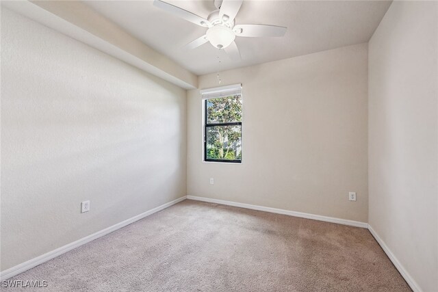 unfurnished room featuring carpet flooring and ceiling fan