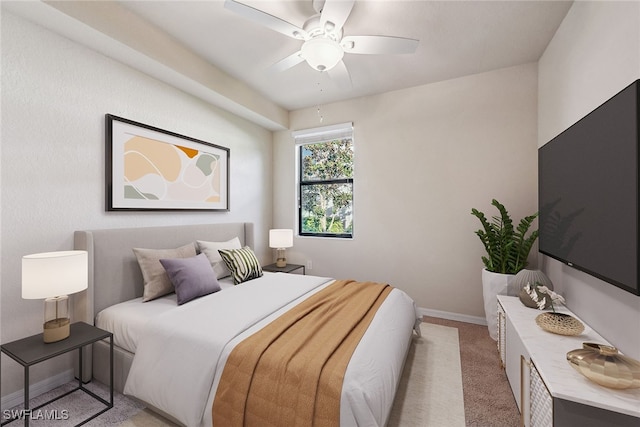 bedroom featuring ceiling fan and light carpet