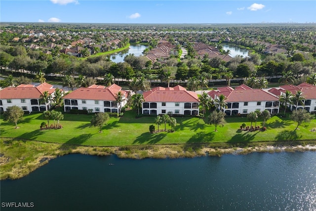 birds eye view of property featuring a water view