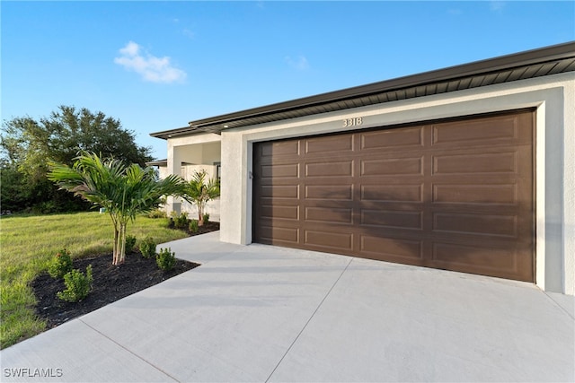 garage with a yard