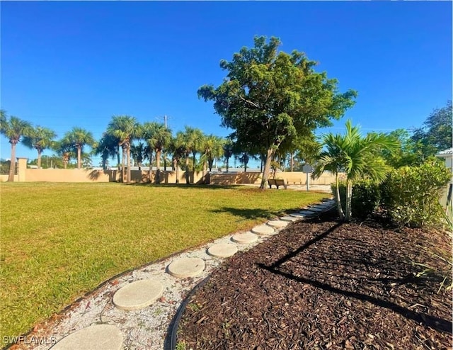 view of yard featuring fence