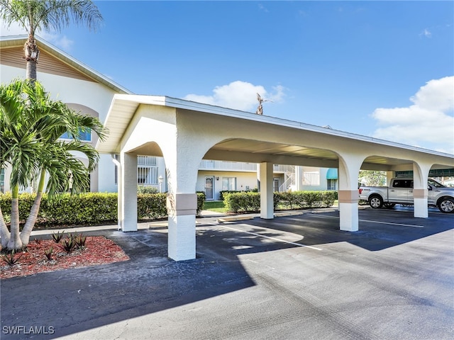 view of parking featuring a carport