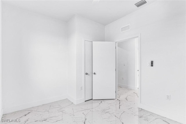 7029 Palpano Cir, Labelle, FL 33935 - spare room with light marble finish floors and baseboards