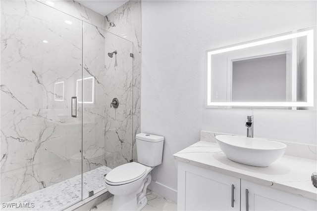 7029 Palpano Cir, Labelle, FL 33935 - full bathroom featuring a marble finish shower, vanity, marble look tiles, toilet, and baseboards