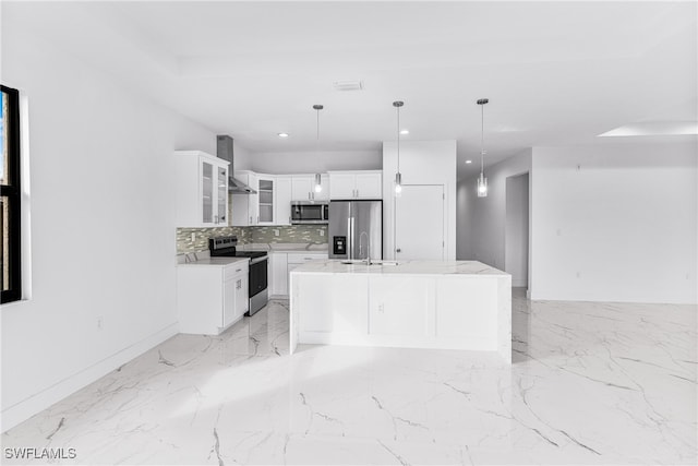 kitchen with hanging light fixtures, white cabinetry, a center island, and stainless steel appliances