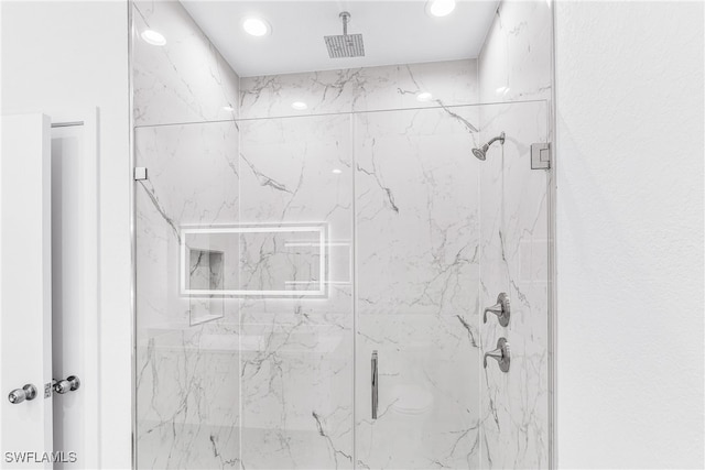 bathroom featuring walk in shower