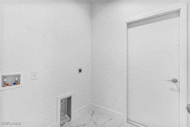 7029 Palpano Cir, Labelle, FL 33935 - laundry room with hookup for an electric dryer, washer hookup, light marble finish floors, baseboards, and heating unit