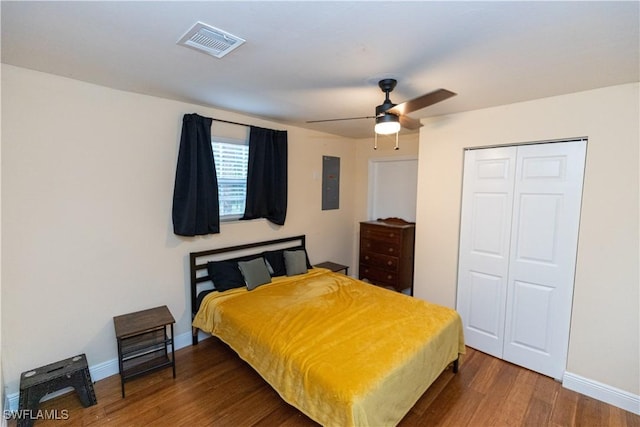 5051 Nature Way, Fort Myers, FL 33905 - bedroom featuring electric panel, wood finished floors, baseboards, a closet, and ceiling fan