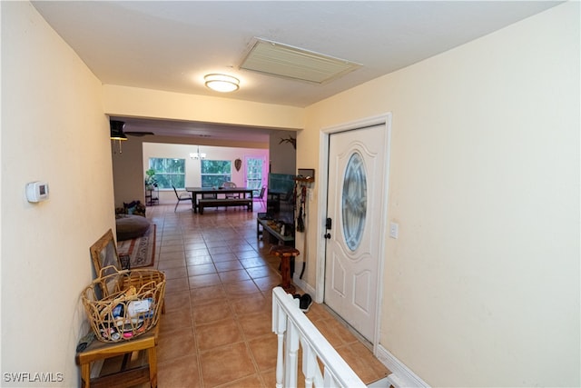 view of tiled foyer entrance