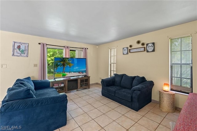 living room with light tile patterned floors