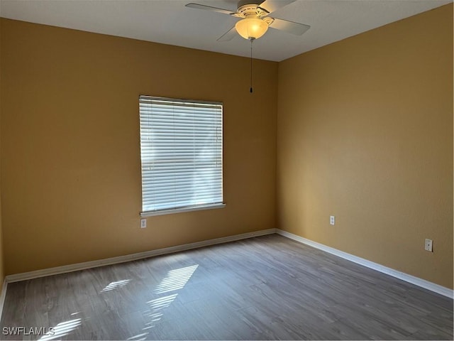11510 Villa Grand Unit 407, Fort Myers, FL 33913 - unfurnished room featuring ceiling fan and wood finished floors