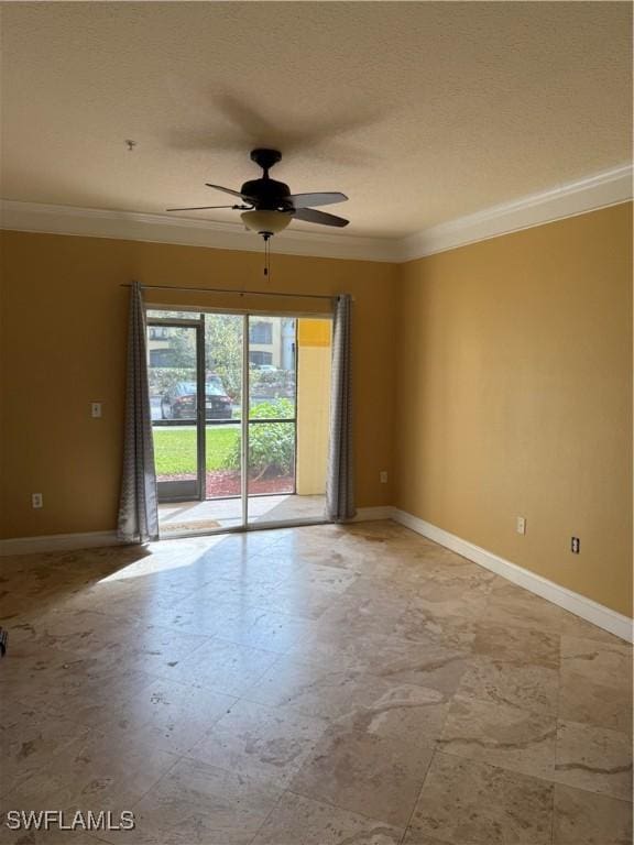 empty room featuring ceiling fan, ornamental molding, and a textured ceiling