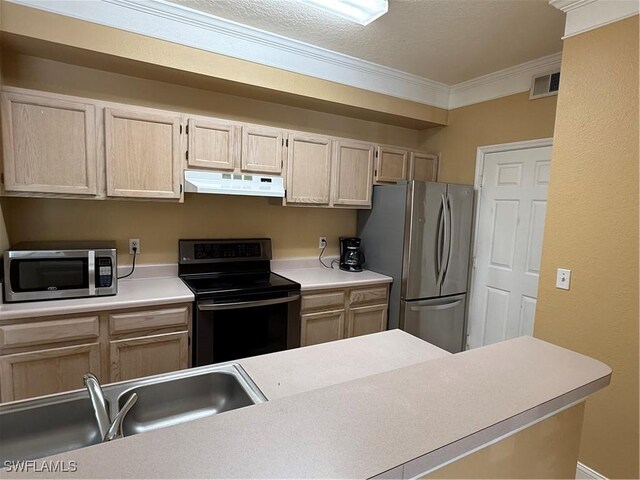 11510 Villa Grand Unit 407, Fort Myers, FL 33913 - kitchen with appliances with stainless steel finishes, under cabinet range hood, crown molding, light countertops, and light brown cabinets