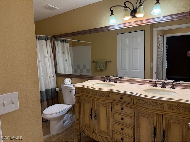 11510 Villa Grand Unit 407, Fort Myers, FL 33913 - full bathroom featuring double vanity, a textured wall, and curtained shower