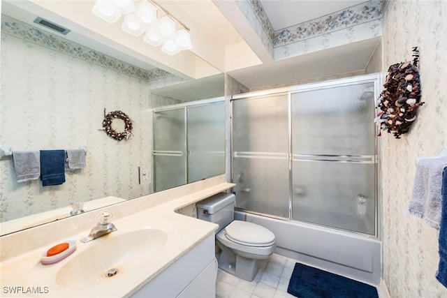 76 Cypress View Dr Unit E-76, Naples, FL 34113 - bathroom featuring wallpapered walls, vanity, toilet, enclosed tub / shower combo, and tile patterned flooring