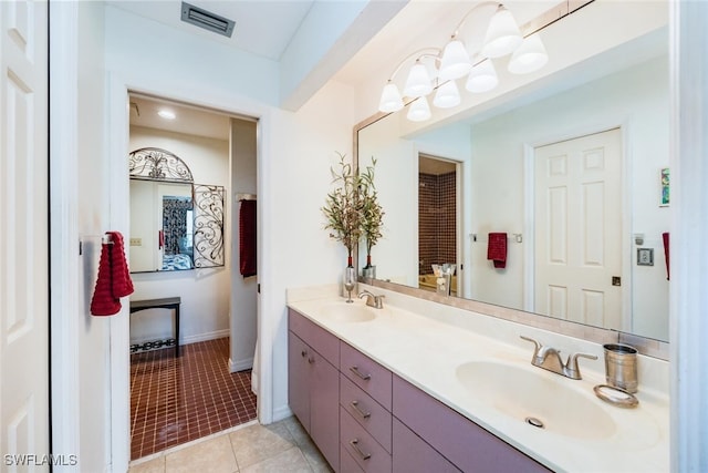 bathroom featuring tile patterned floors and vanity