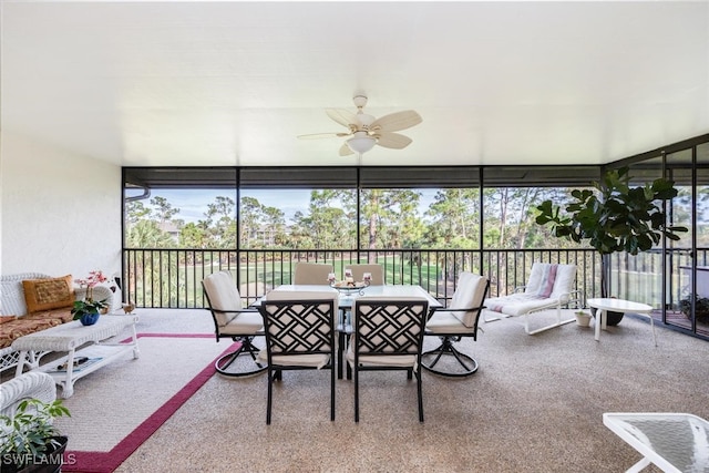 sunroom / solarium with ceiling fan