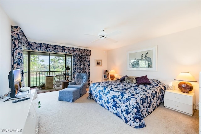 bedroom with access to outside, ceiling fan, and light colored carpet