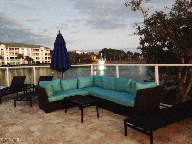 76 Cypress View Dr Unit E-76, Naples, FL 34113 - view of patio / terrace featuring an outdoor hangout area
