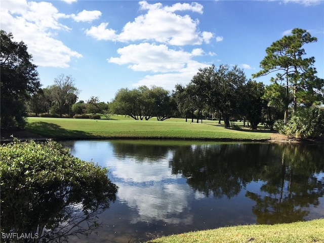 76 Cypress View Dr Unit E-76, Naples, FL 34113 - water view with a tree filled landscape