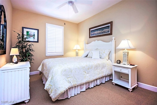 bedroom with ceiling fan and carpet floors