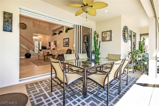 dining room featuring ceiling fan