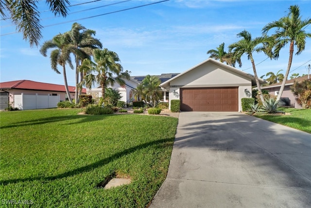 ranch-style home with a garage and a front yard