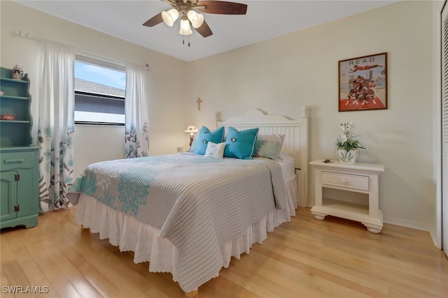 bedroom featuring ceiling fan and light hardwood / wood-style flooring