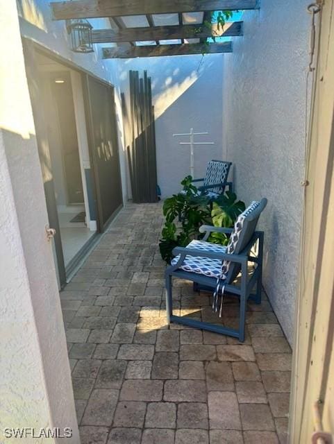 view of patio / terrace featuring a pergola