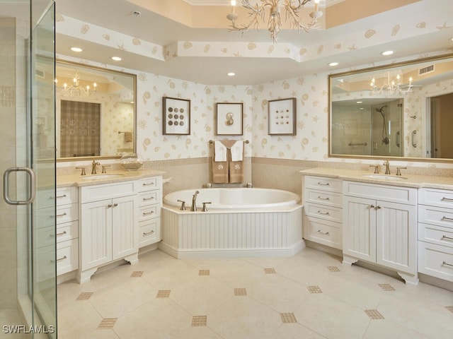 bathroom with tile patterned floors, vanity, ornamental molding, and shower with separate bathtub