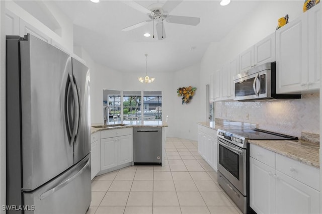 2819 SW 37th Ter, Cape Coral, FL 33914 - kitchen with appliances with stainless steel finishes, a sink, recessed lighting, and white cabinetry
