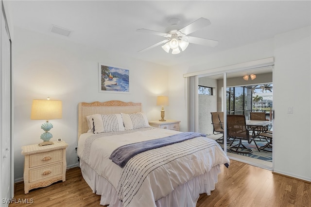 bedroom featuring ceiling fan, wood-type flooring, access to outside, and a closet