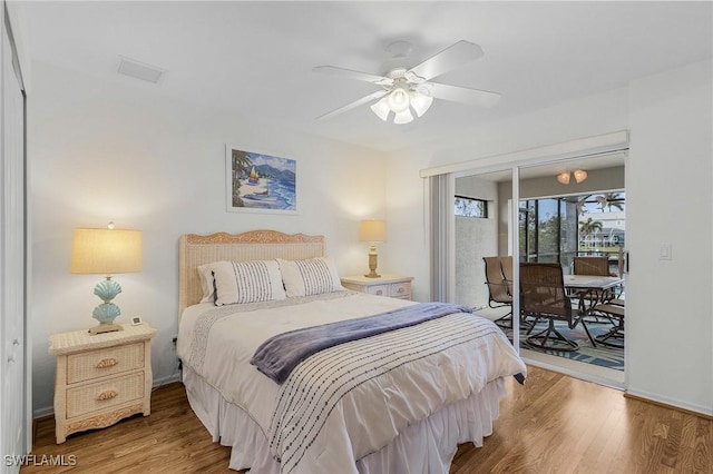 2819 SW 37th Ter, Cape Coral, FL 33914 - bedroom featuring access to outside, wood finished floors, ceiling fan, and baseboards