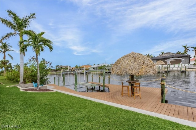 2819 SW 37th Ter, Cape Coral, FL 33914 - dock with a lawn, a water view, and boat lift