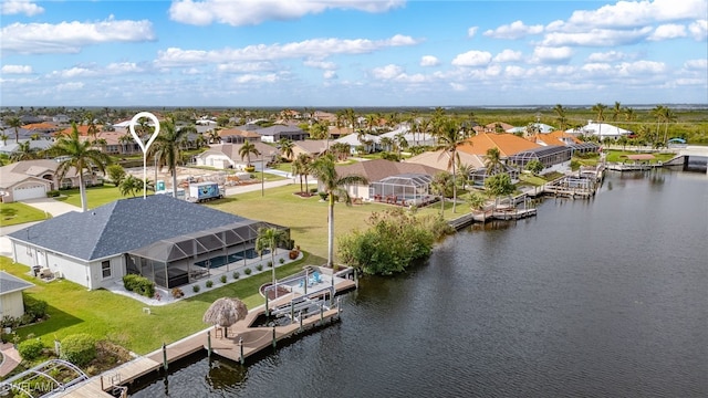 bird's eye view with a water view