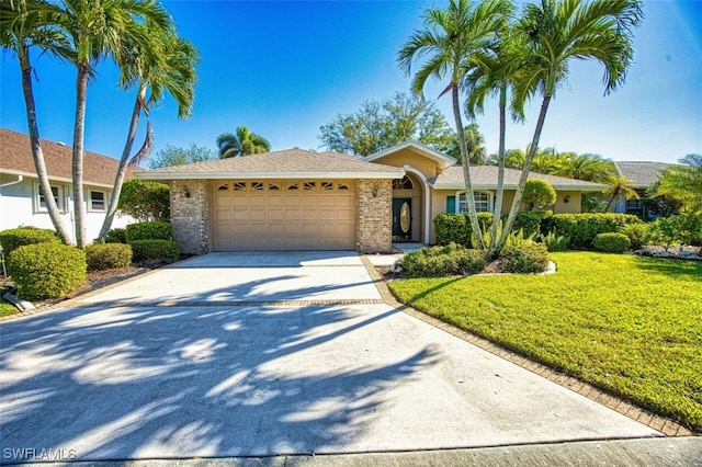 ranch-style house with a garage and a front lawn