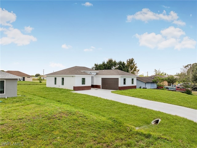 exterior space with a front yard and a garage