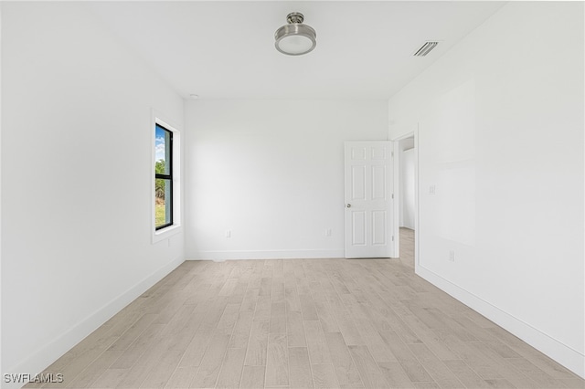 empty room featuring light hardwood / wood-style floors