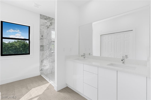 bathroom with vanity, hardwood / wood-style flooring, and an enclosed shower