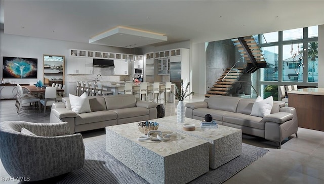 27804 Hickory Blvd, Bonita Springs, FL 34134 - living room featuring stairway