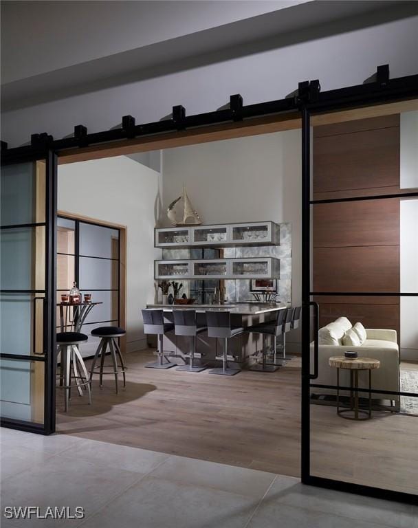 27804 Hickory Blvd, Bonita Springs, FL 34134 - interior space featuring a barn door