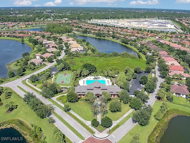 birds eye view of property featuring a water view