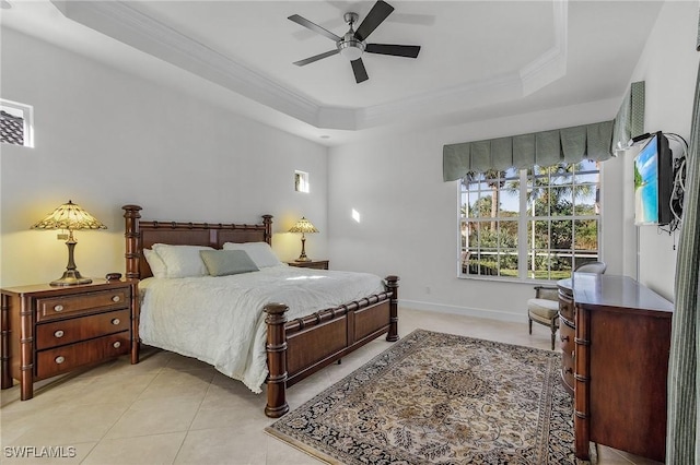 bedroom featuring light tile patterned floors, a raised ceiling, ceiling fan, and crown molding