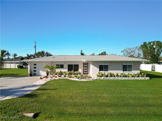 ranch-style house with a front lawn and a garage