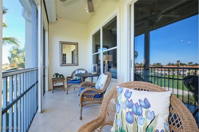 balcony featuring ceiling fan