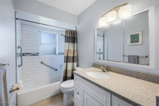 full bathroom featuring shower / bath combination with curtain, vanity, and toilet