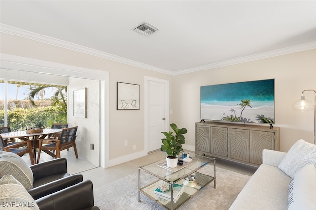 living room with ornamental molding